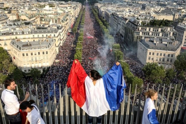 In Pictures: Emblematic Champs Elysées hosts enormous World Cup party