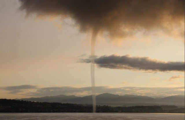 Waterspouts form over Swiss lakes as cold weather hits