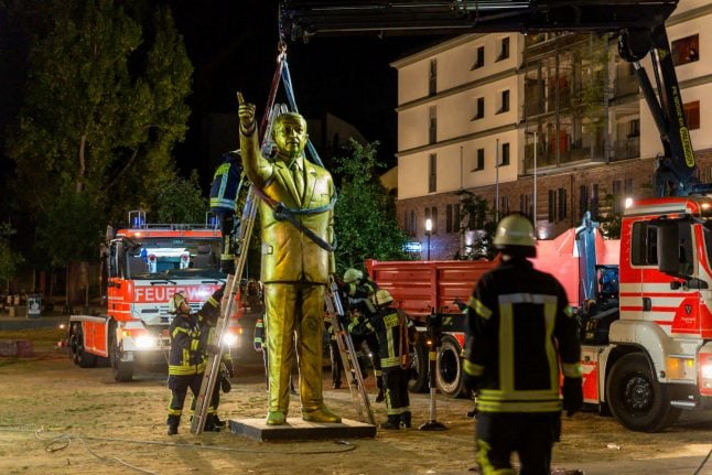 Golden statue of Erodgan set up by artists in Wiesbaden removed after friction