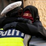 Photo of Danish policewoman and Muslim hugging at demonstration goes viral