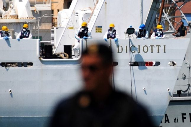 Nearly 200 rescued migrants held aboard Italian coastguard ship docked in Sicily