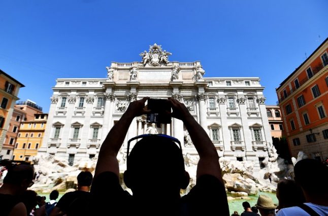 From selfie brawls to midnight swims: Tourists behaving badly at Rome's Trevi Fountain