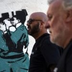 Mural of Spanish police officers snogging ‘not a Banksy’ after all