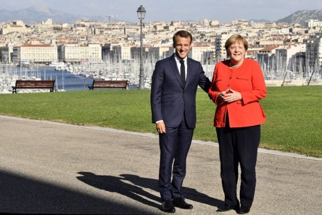 Merkel, Macron look to fire up stuttering Franco-German motor