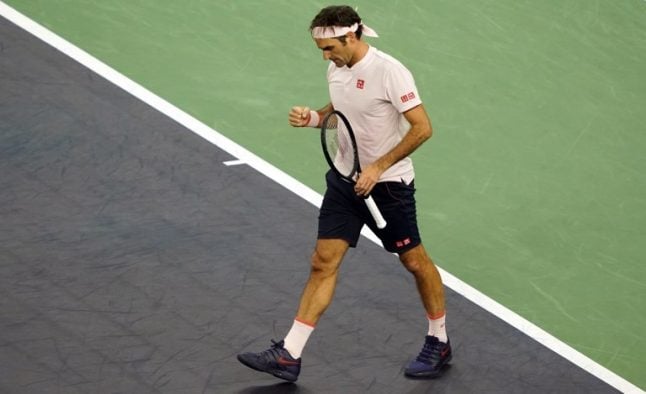 Swiss star Federer battles into quarters at the Shanghai Masters