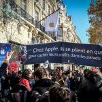 ‘Apple, pay your taxes!’: Protest greets US tech giant’s Champs-Élysées launch