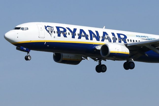 Ryanair fires six crew members for staging 'sleeping on floor' photo