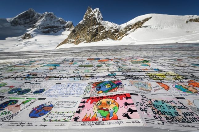 Record-breaking Swiss Alps postcard sends message against climate change