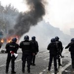 IN IMAGES: Burning barricades, tear gas and water cannon – The battle of the Champs-Elysées