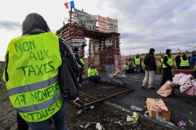 French government 'to suspend fuel tax hikes' in bid to calm violent protests