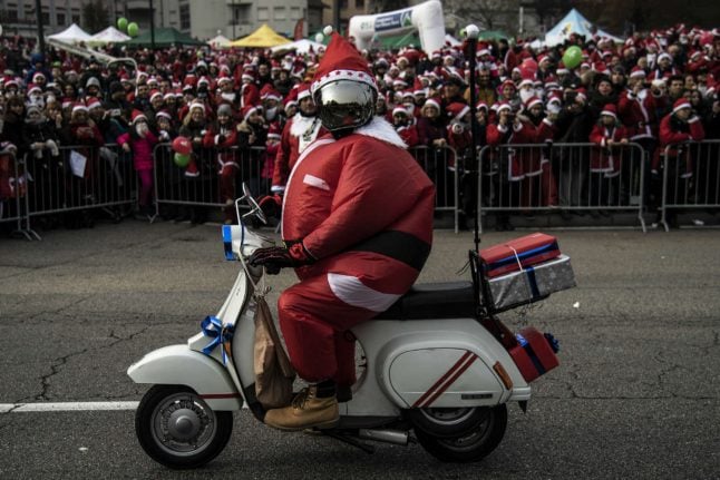 Santas rally for charity in Italy
