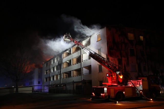 100 apartments evacuated after fire in western Sweden