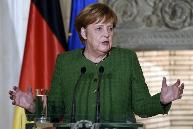 Merkel says Germany recognizes responsibilty for Nazi crimes in Greece