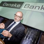 Scandal-hit Danske Bank vows tighter controls as profit tumbles
