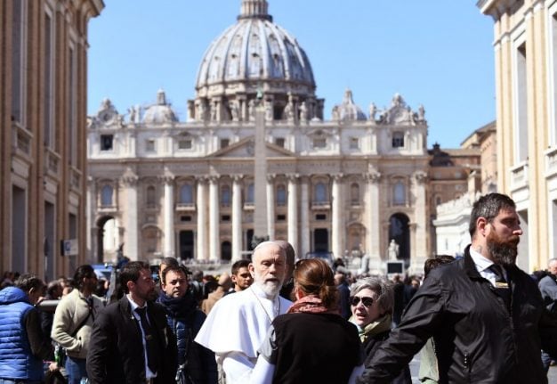 PHOTOS: Double takes in Rome as John Malkovich plays pope