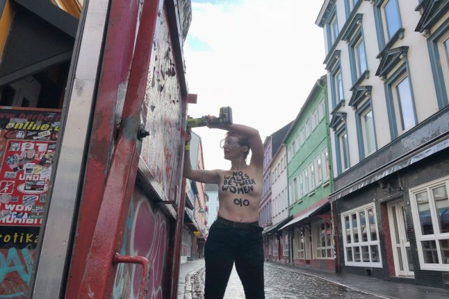 Feminist activists tear down gate to Hamburg brothels