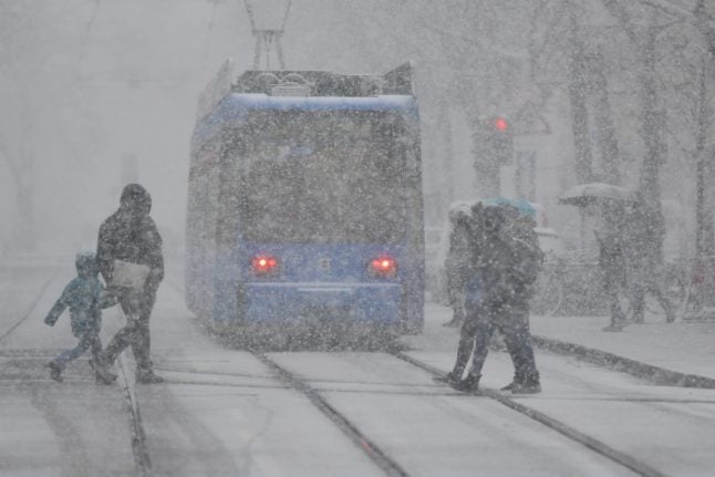 IN PICTURES: High winds, torrential rain and snow hit Germany