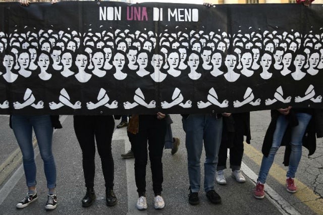 Tens of thousands march in Italy against anti-abortion meet