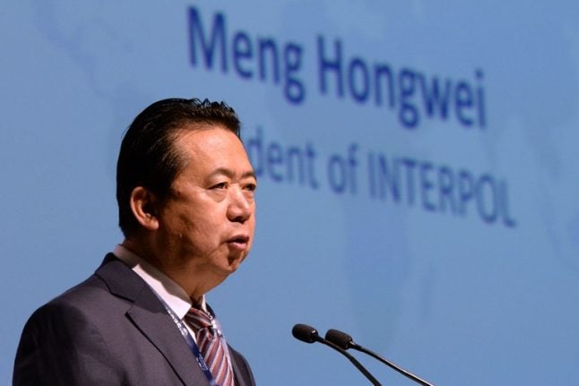 China offering no proof against ex-Interpol chief, wife says
