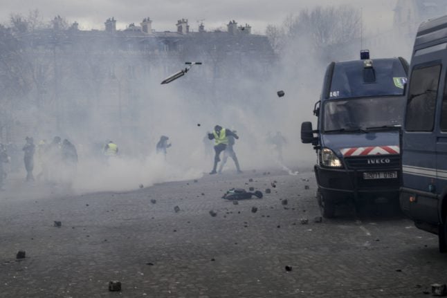 Macron battles to end controversy over use of army against 'yellow vests'