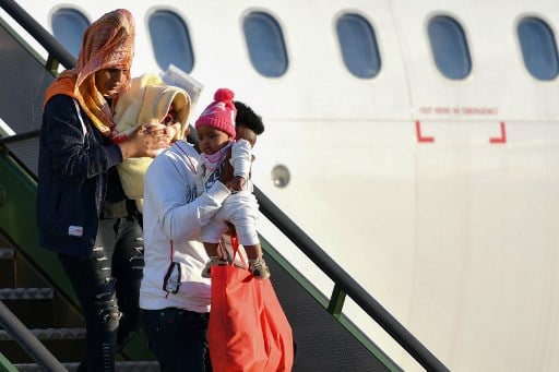Italy accepts 147 refugees flown in from Libya