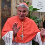 Cardinal breaks police seal to return power to Rome families