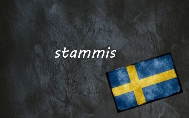 the word stammis written on a blackboard next to the swedish flag