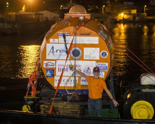Triumphant 72-year-old Frenchman celebrates after crossing Atlantic... in a barrel