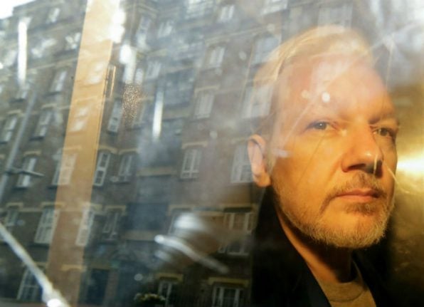 Assange illness postpones US extradition hearing until June
