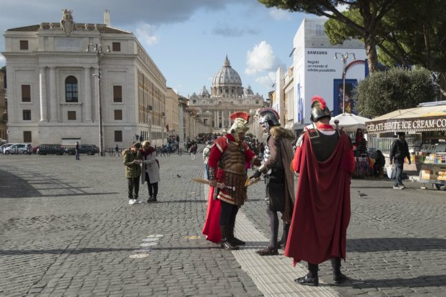 'Don’t dress up as a Roman': Rome to punish tourists for messy eating and bad manners at historic sites