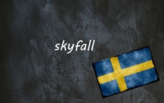 the word skyfall written on a blackboard next to the swedish flag