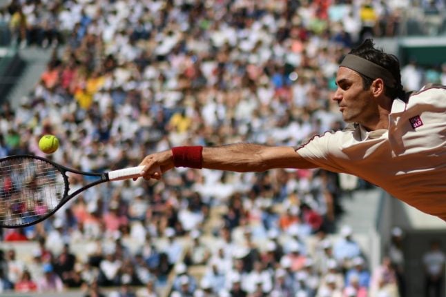 Nostalgic Federer marks 'impressive' 400th Grand Slam match record with win