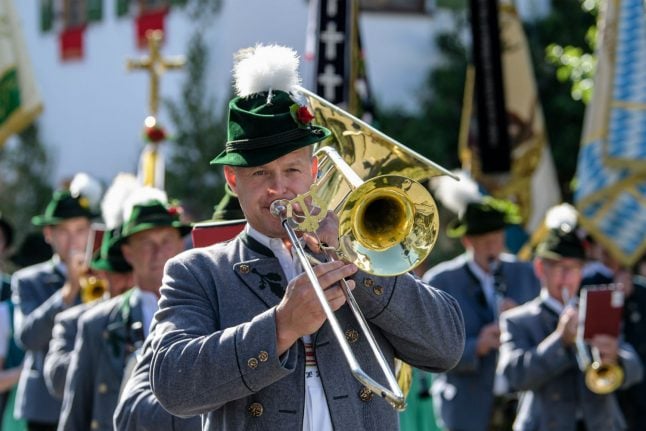 A music band marches in the Corpus Christi procession in Seehausen am Staffelsee, Bavaria, in 2018.