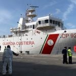 Italy agrees to let 116 rescued migrants off coastguard ship
