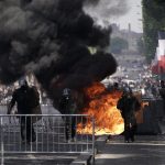 French police battle ‘yellow vest’ protesters then Algeria football fans in tense Bastille Day