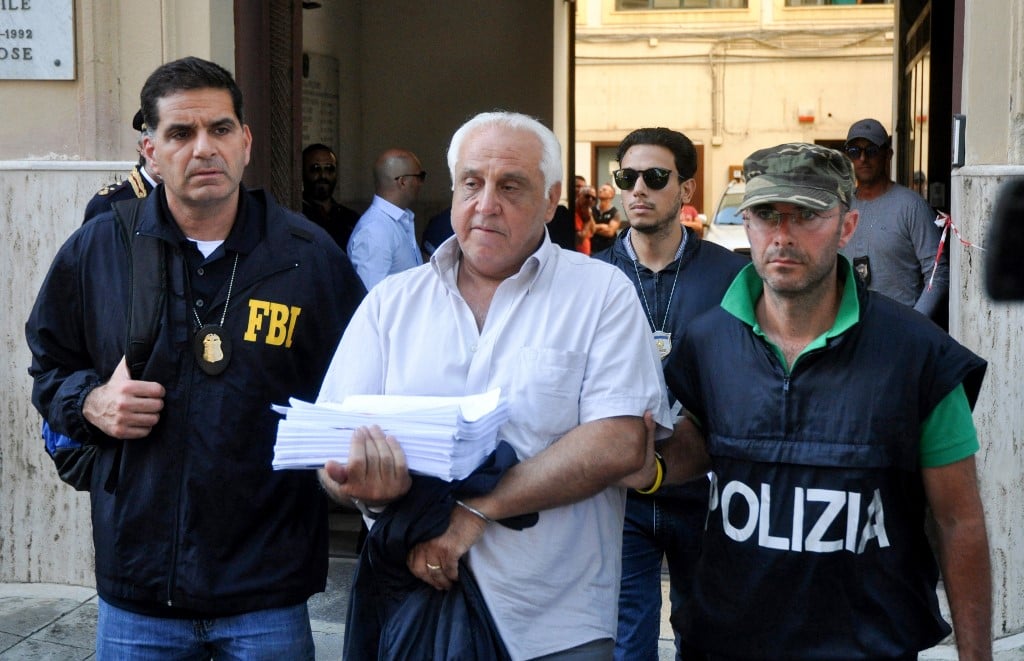 Italian police join FBI in raids on historic mobster families