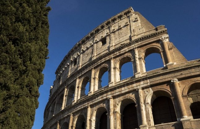 Man climbs Rome's Colosseum and threatens to jump