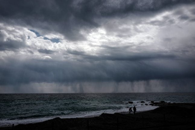 There goes the sun: Storms, hail and lightening batter Italy