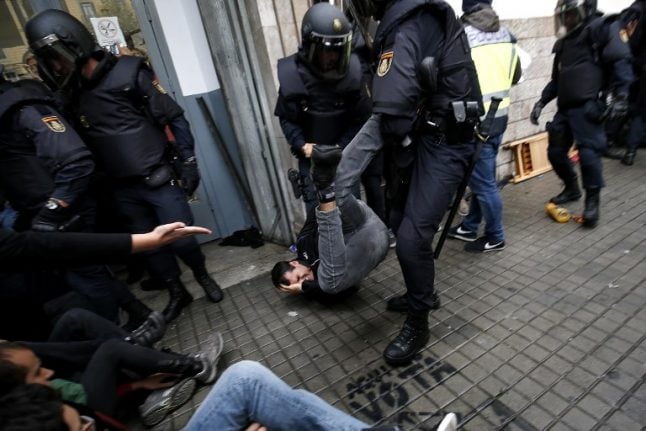 Eight police officers to be investigated over violence at Catalan referendum polls