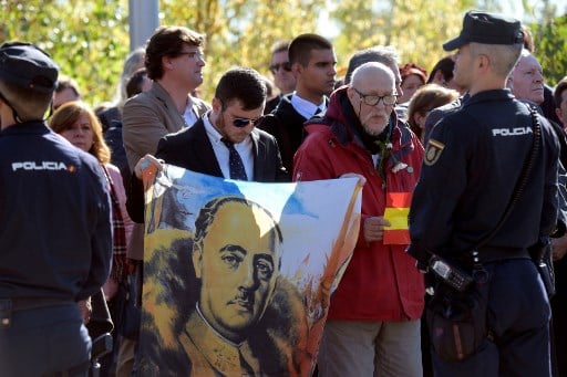 IN PICTURES: Franco exhumed, transported by helicopter, and reburied as Spain takes 'step towards reconciliation'