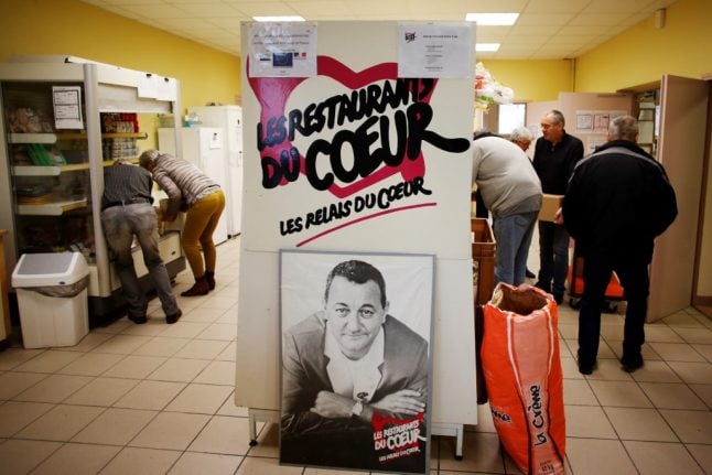 Who are 'Les Restos du Cœur' and why are they collecting in French supermarkets?