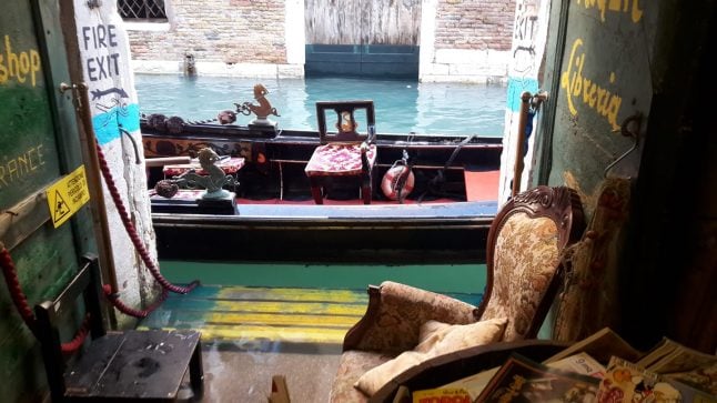 Venice’s legendary ‘waterproof’ bookshop overwhelmed by floods