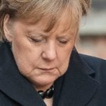 Remembering Nazi crimes inseparable from German identity, says Merkel