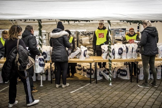 Why are record numbers in Denmark asking for charity help this Christmas?