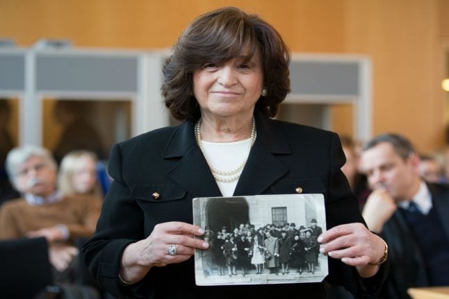 Survivor born in Auschwitz says stories of atrocity must be told