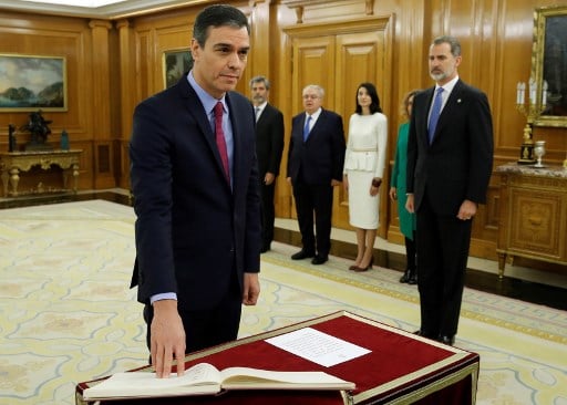 Pedro Sanchez sworn in as head of Spain's first coalition government since 1936