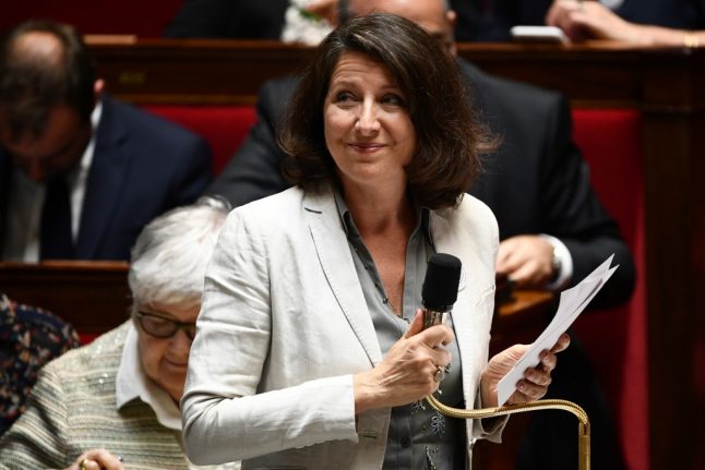 French health minister steps up to Paris mayor race after sex tape scandal