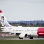 Norwegian to slash staff by half in wake of Trump travel ban