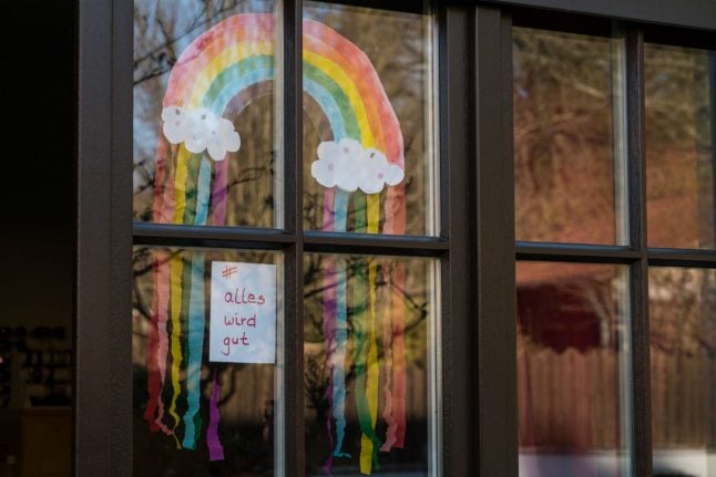 Why there are so many rainbows on German windows and footpaths