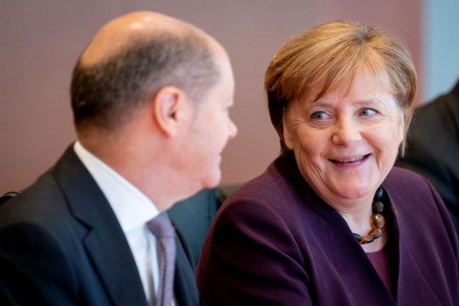 Merkel returns to office after two weeks in self-quarantine